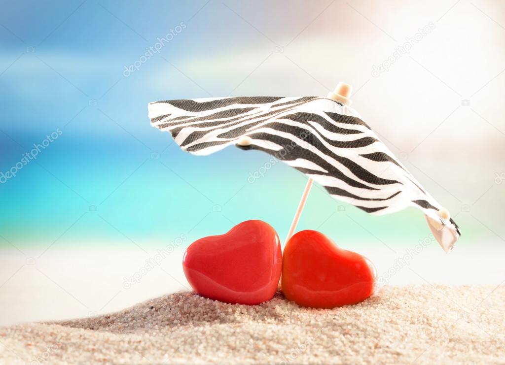 Two hearts on the summer beach