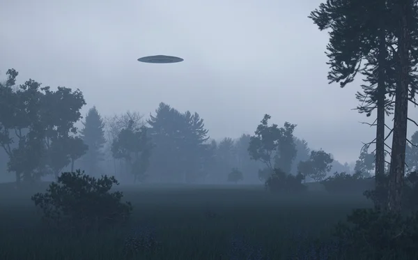 나무 위에 Ufo 스톡 이미지