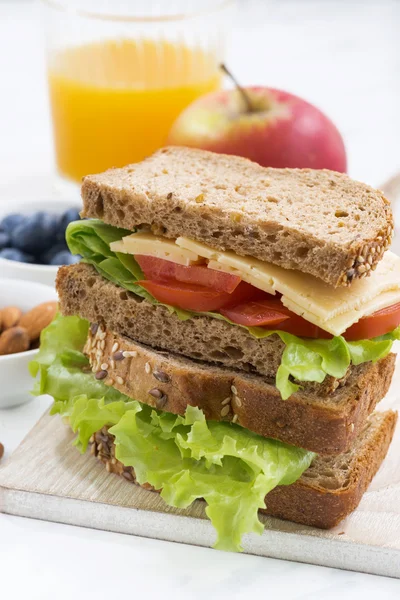 school lunch with sandwich of wholemeal bread, closeup