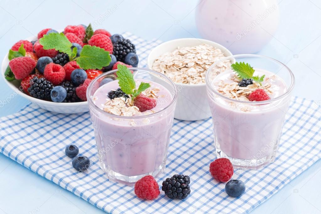 healthy berry smoothies with oatmeal in a glass, horizontal