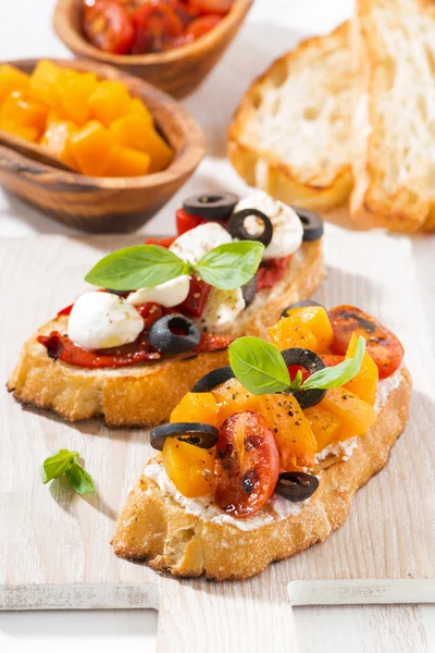 Italian appetizer - bruschetta, vertical — Stock Photo, Image