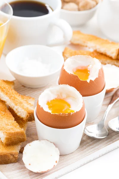 Delicious breakfast with boiled eggs and crispy toasts, vertical — Stock Photo, Image