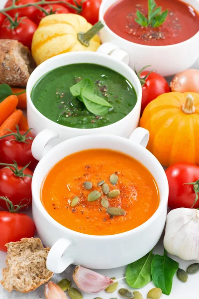 Assortment of vegetable cream soups and ingredients, vertical — Stock Photo, Image