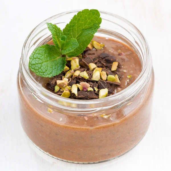 Chocolate pudding with pistachios, closeup — Stock Photo, Image