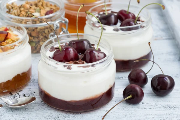 Dessert with cream, cherry and peach jam, closeup — Stock Photo, Image