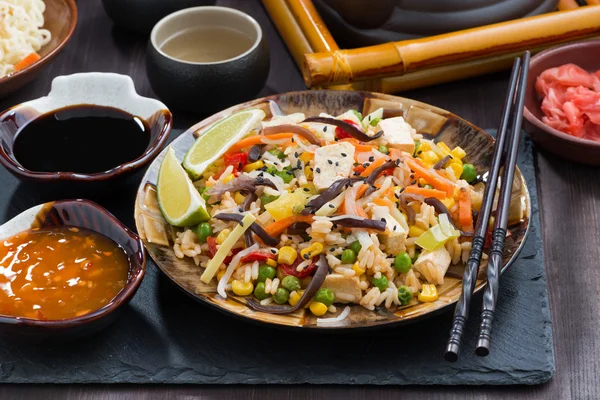 Fried rice with tofu and vegetables on table — Stock Photo, Image