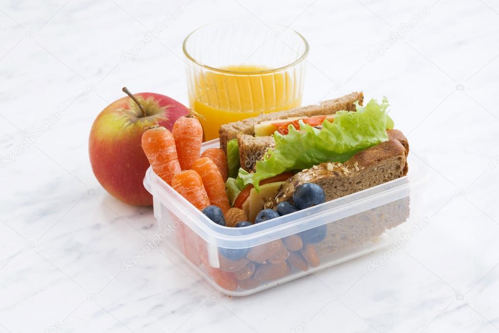 lunch box with sandwich of wholemeal bread