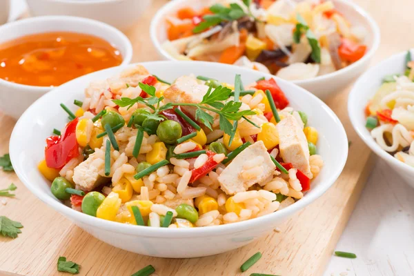 Asian lunch - fried rice with tofu, noodles with vegetables — Stock Photo, Image