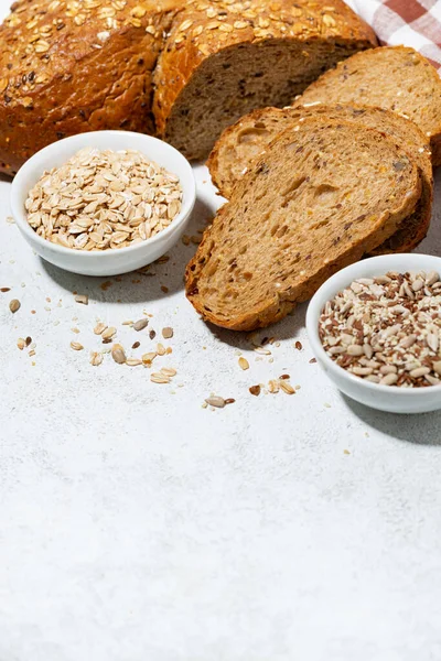 Fresh Bread Oatmeal Seeds Cut Slices Vertical Top View — Stock Photo, Image