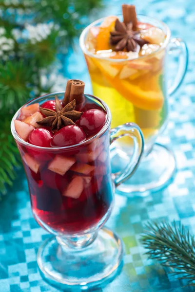 Christmas mulled wine and apple cider on a blue background — Stock Photo, Image