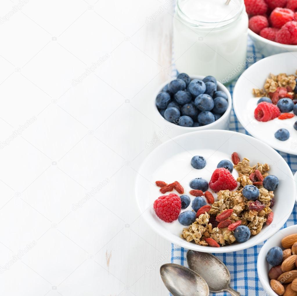 Breakfast with granola, yogurt and berries