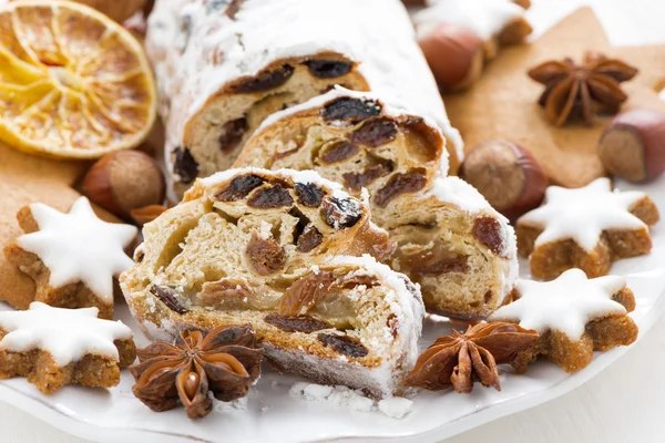 Christmas Stollen, assorted cookies and spices — Stock Photo, Image