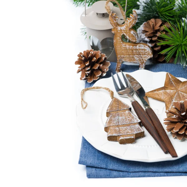 Christmas table setting with wooden decorations over white — Stock Photo, Image