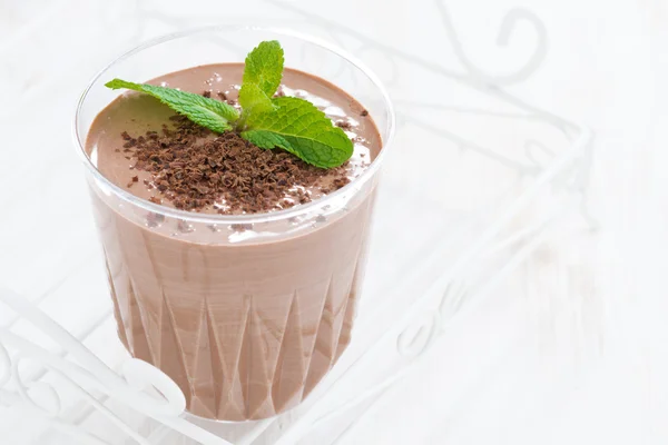 Chocolate milkshake in a glass on white background — Stock Photo, Image