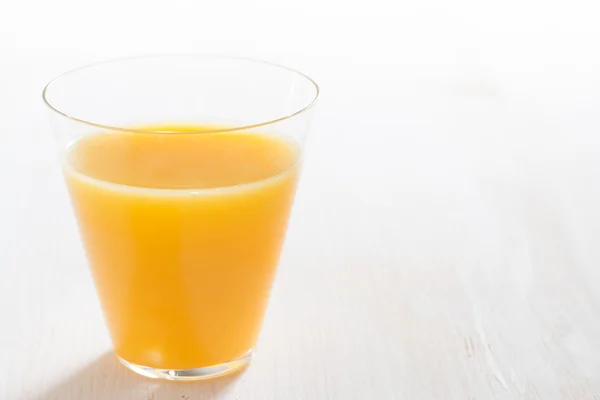 Glass of fresh orange juice — Stock Photo, Image