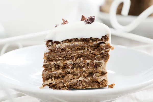 Stuk van koffie taart met suikerglazuur, close-up — Stockfoto