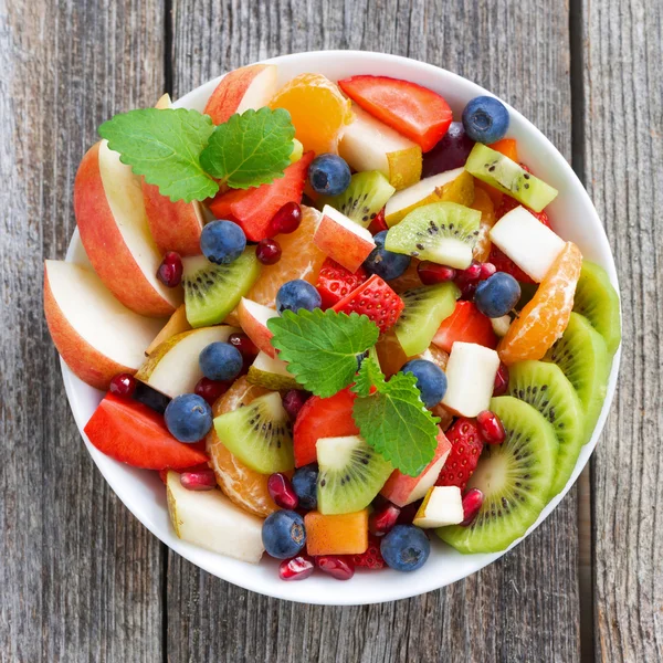 Fruit and berry salad, top view, close-up — Stok Gambar Fruit and berry salad, top view, close-up Stok Foto