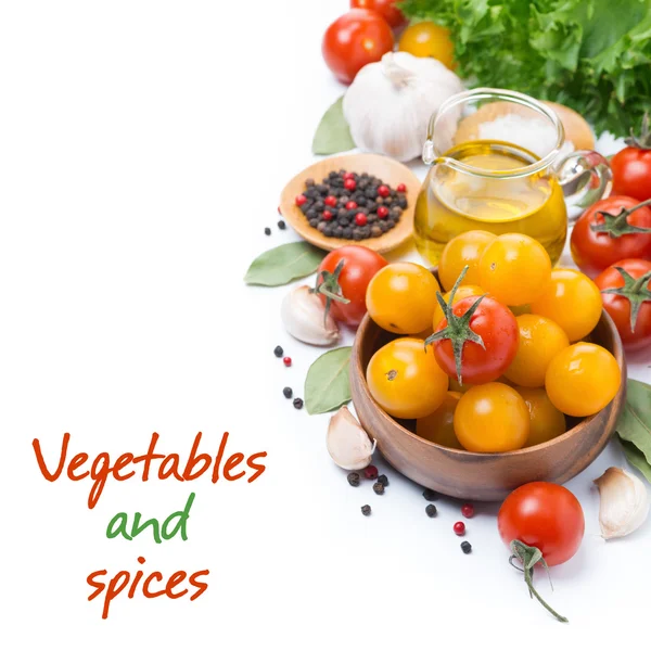 Yellow and red cherry tomatoes, olive oil, herbs and spices — Stock Photo, Image