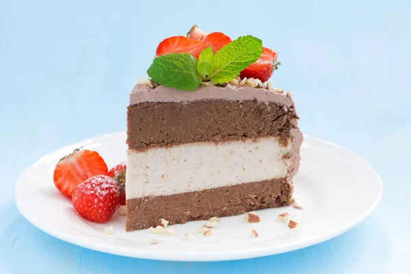 Piece of chocolate cake of three layers — Stock Photo, Image