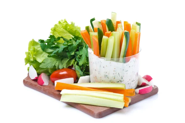 Vegetables with yogurt sauce in a glass and fresh herbs — Stock Photo, Image