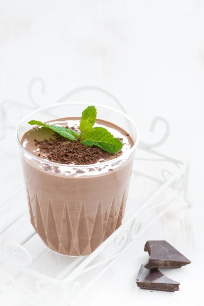 Chocolate milkshake with mint in a glass on white background — Stock Photo, Image