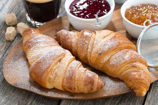 Delicious breakfast with fresh croissants, close-up — Stok fotoğraf