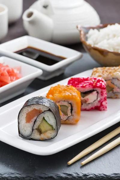 Japanese food - sushi and rolls, vertical — Stock Photo, Image