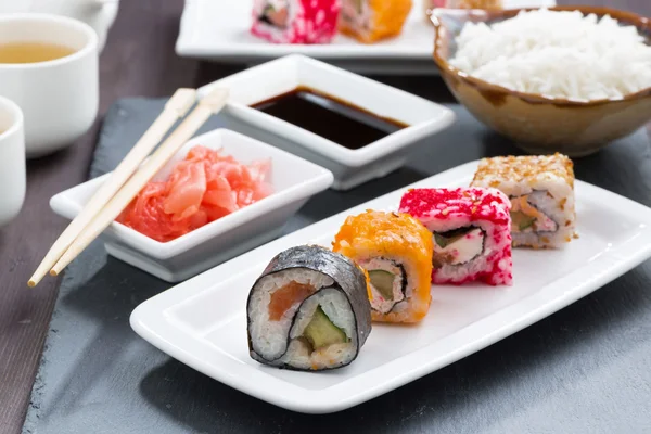 Japanese meal - sushi and rolls — Stock Photo, Image