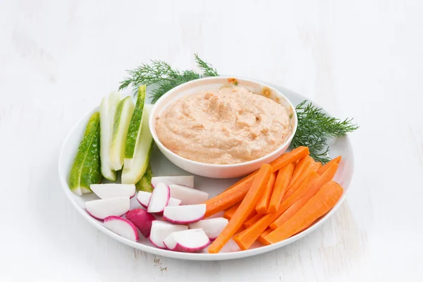 Tomato sauce with tofu and fresh vegetables on white table — Stock Photo, Image