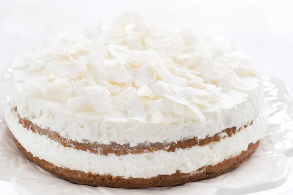 Chocolate cake with coconut cream, close-up — Stock Photo, Image