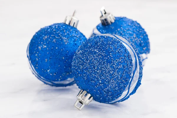 Blue Christmas balls on a white background, closeup — Stock Photo, Image