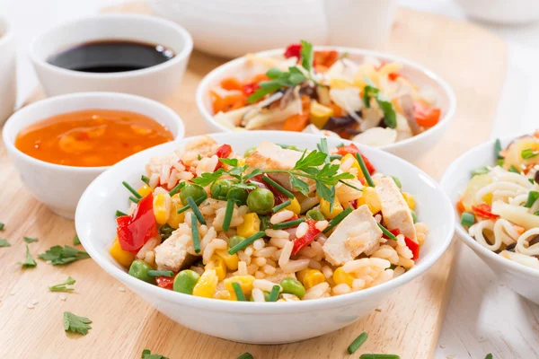 Asian lunch - fried rice with tofu, noodles with vegetables — Stock Photo, Image