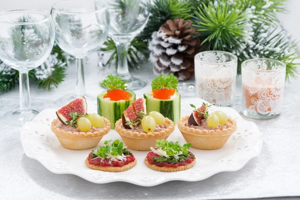 Set of festive Christmas mini appetizers on table — Stock Photo, Image