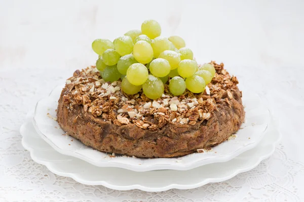 Whole nut pie with grapes — Stock Photo, Image