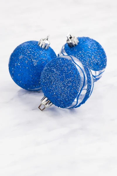 Blue Christmas balls on a white background, vertical — Stock Photo, Image