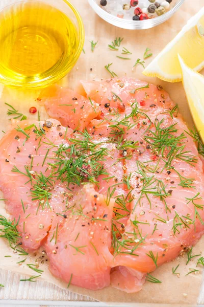 Salted salmon with dill on a wooden board, close-up, top view — Stock Photo, Image