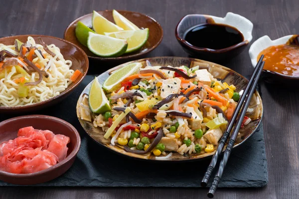 Asian lunch - fried rice with tofu and vegetables — Stock Photo, Image