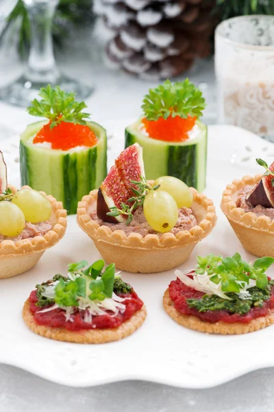 Set of festive Christmas mini appetizers, vertical, closeup — Stock Photo, Image