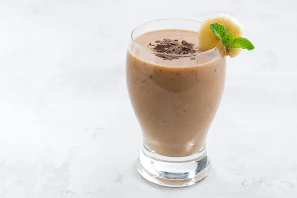 Banana chocolate smoothie in a glass — Stock Photo, Image