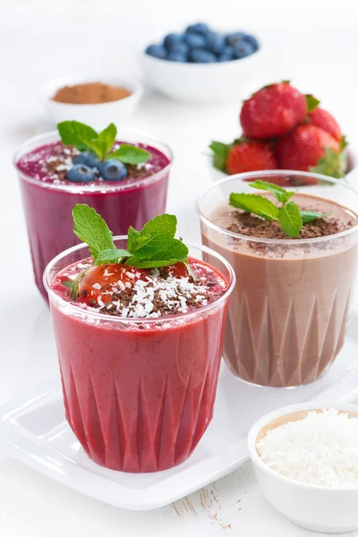 Assorted milkshakes - strawberry, chocolate and blueberry — Stock Photo, Image