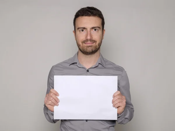 Man holding a cartel — Stock Photo, Image