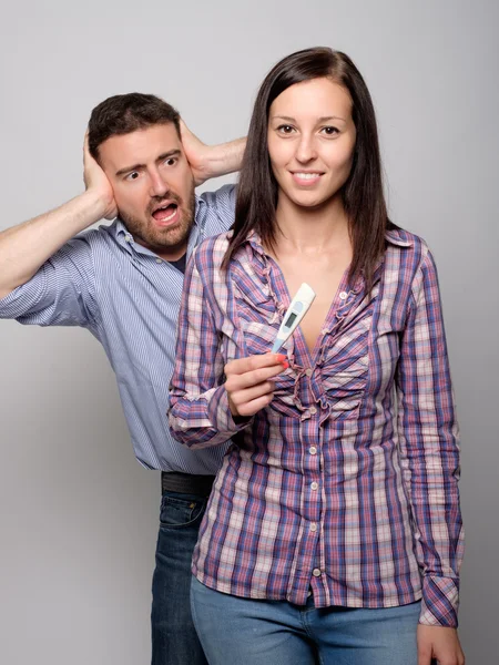 Portrait of scared boyfriend after positive pregnancy test resul — Stock Photo, Image