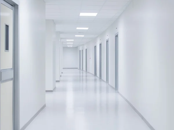 Empty white corridor background with doors — Stock Photo, Image