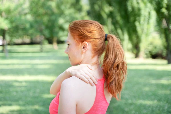 One Woman Runner Hold Her Injured Neck Shoulder Outdoor —  Fotos de Stock