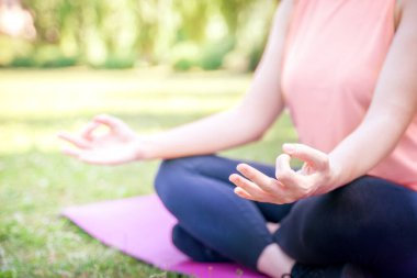 Woman practicing yoga for concentration, breath, shape body