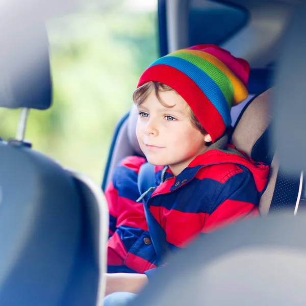 Portrait of preschool kid boy sitting in car — Stock Photo, Image
