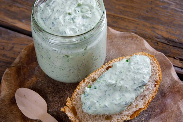 Fresh homemade wild garlic cottage cheese. Home made sauce made with wild garlic, milk products.