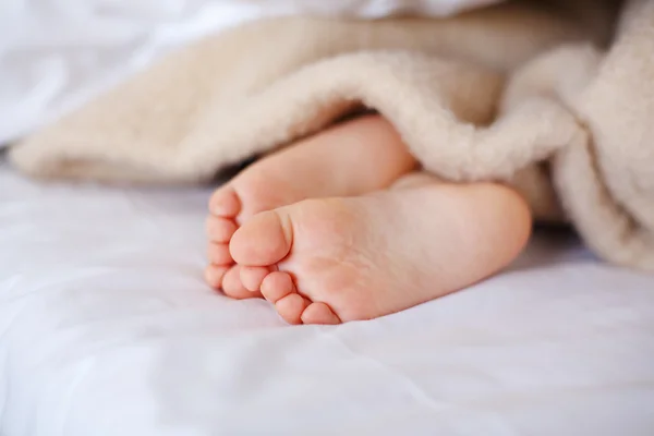 Feet of little sleeping child — Stock Photo, Image