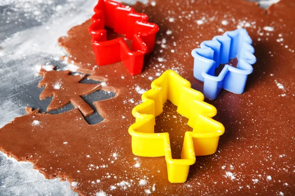 Baking ginger bread cookies as Christmas trees with colorful for — Stock Photo, Image