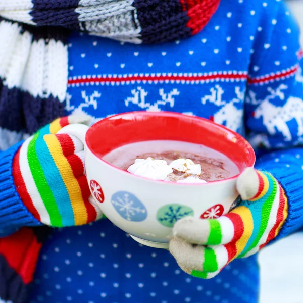 Portrait of little toddler boy in winter clothes with falling sn — Stock Photo, Image